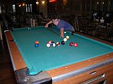 Bangkok 01 04 Buddy Lodge Playing Pool Bangkok�s Buddy Lodge has its own restaurant where we had our buffet breakfast. Afterward, Peter and I played pool.